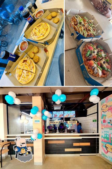The photo of food and interior at Domino's Pizza Daulatpur, Vidisha