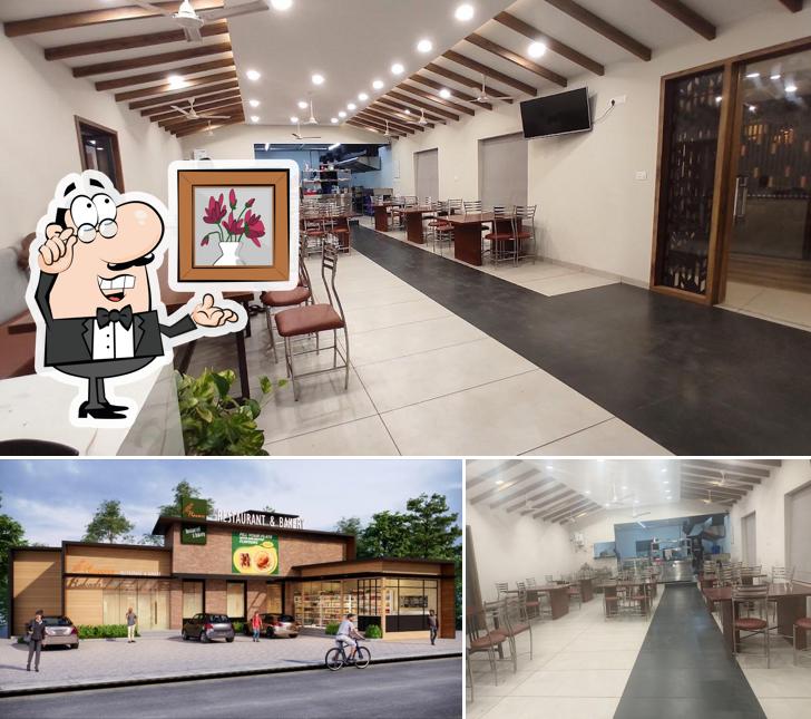 Take a look at the photo depicting interior and exterior at Flavours Restaurant and bakery