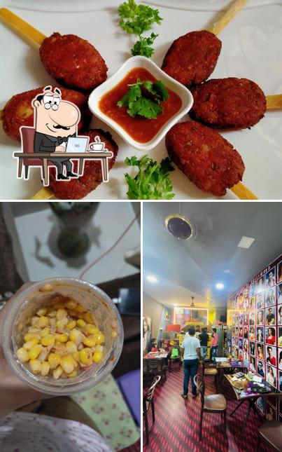 Take a seat at one of the tables at NIK'S BOLLYWOOD FOODIES ADDA