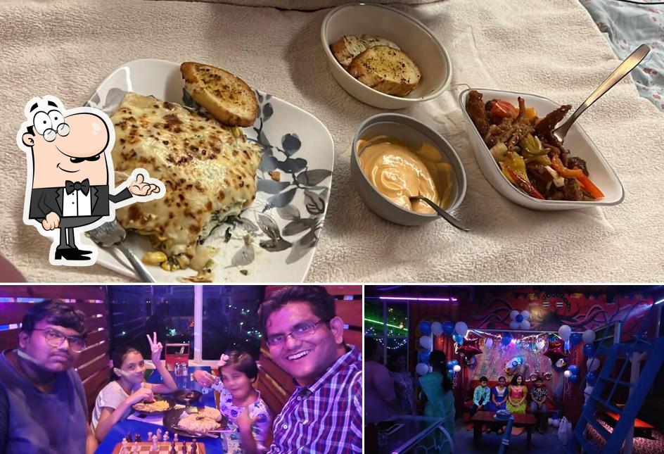 The image of interior and food at World Of Tortillas- Kakinada