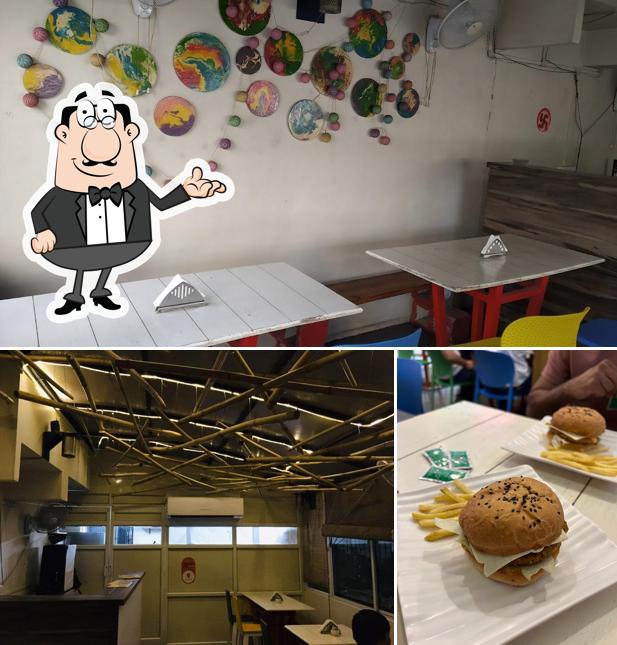 Take a seat at one of the tables at 0265 Burgers Pizzas & Gelateria by 0265 (Gelato)