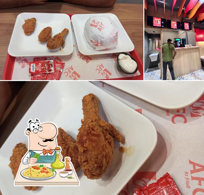 Check out the image depicting food and interior at AFC it's FRIED PERINTHALMANNA