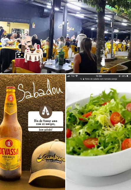 A imagem da comida e interior a Cumbuca Bar e Cozinha