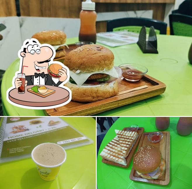 Order a burger at CAFE RAINDERFOREST