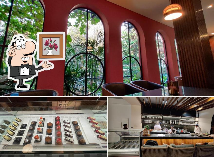 Take a seat at one of the tables at ZUCI - Artisanal Chocolates & Cafe