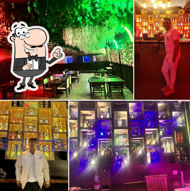Take a seat at one of the tables at Tomorrow Land Bar & Restaurant