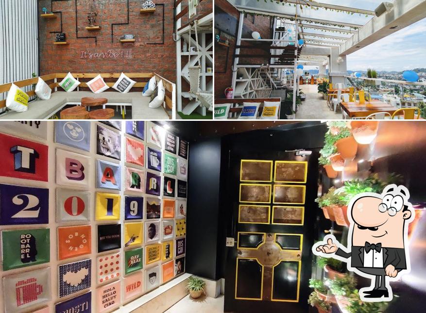 Take a seat at one of the tables at The Root Barrel