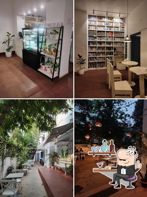 Take a seat at one of the tables at Cafe 16 Satyanagar