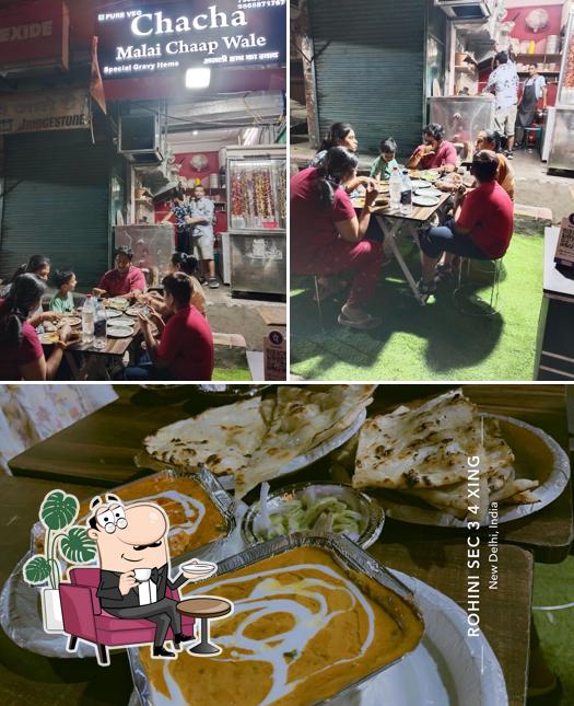 Take a look at the picture showing interior and food at Chacha Malai Chaap Wale