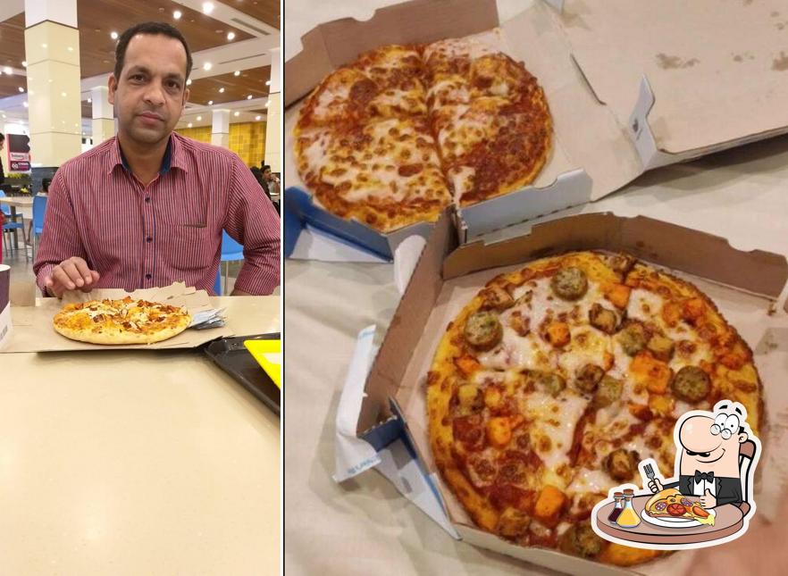 Get pizza at Domino's Pizza HilIte Mall, Calicut