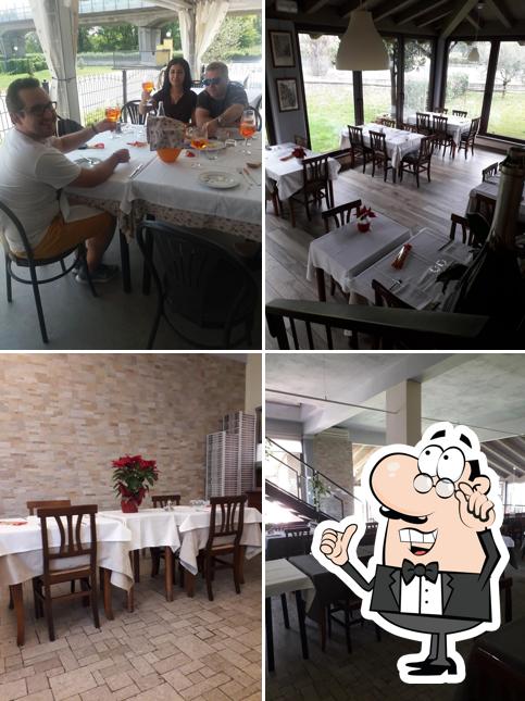 Dai un'occhiata agli interni di Ristorante Braceria Pizzeria La Favorita