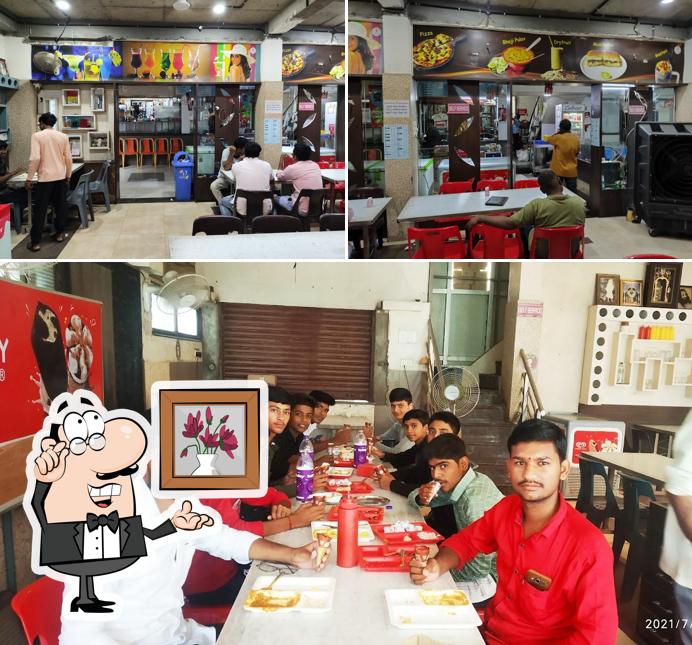 Take a seat at one of the tables at Jain Bandhu Pav Bhaji Centre