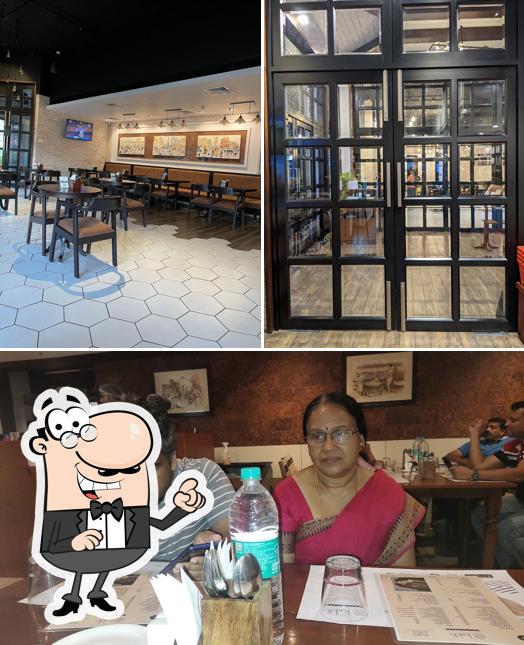 Take a seat at one of the tables at Navya Patisserie