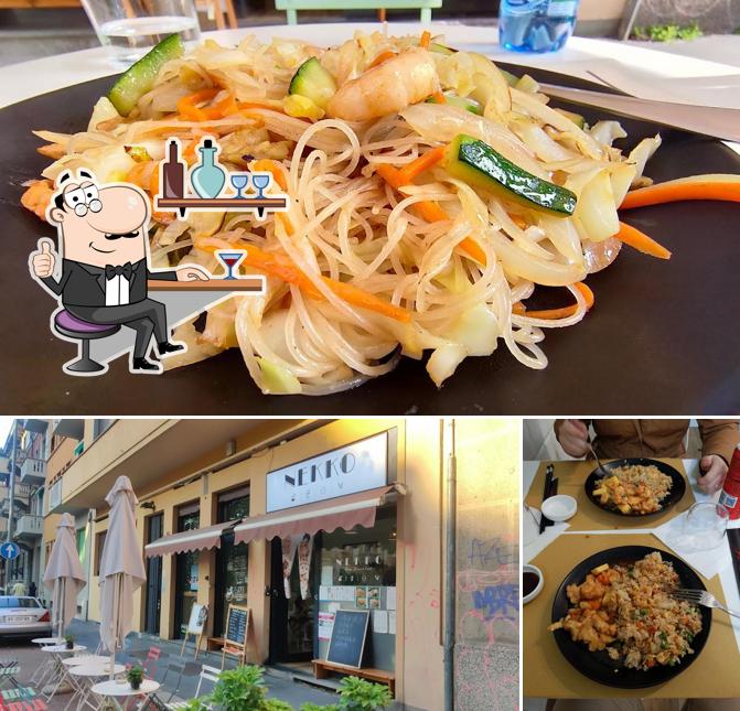 Siediti a un tavolo di NEKKO Cucina Cinese-Ramen House