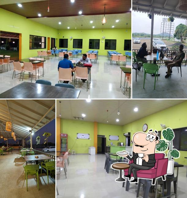 Take a seat at one of the tables at Hotel Shree Hari Pandurang