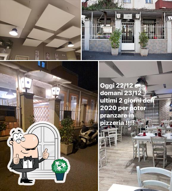Guarda gli esterni di Pizzeria Tre Quarti
