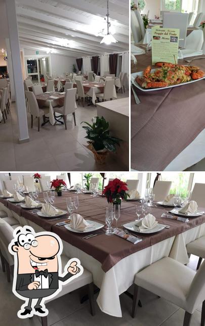 Tra le diverse cose da Poggio del Vento Ristorante Pizzeria si possono trovare la interni e cibo