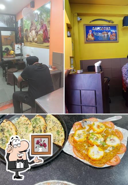 This is the image showing interior and food at Bali's Punjabi Dhaba (Sarweshvar Chowk Wala)