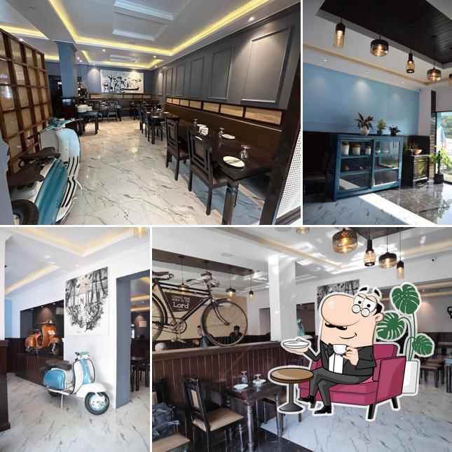 Take a seat at one of the tables at Vintage Restaurant (Pernem)