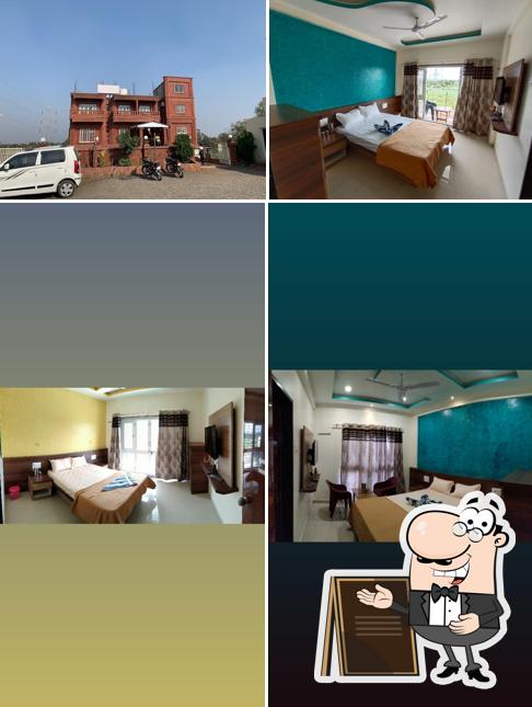 Enjoy the view at the outside area of HOTEL SACHIN EXECUTIVE