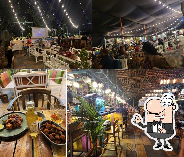 Take a seat at one of the tables at Hippie @ Heart Kothrud