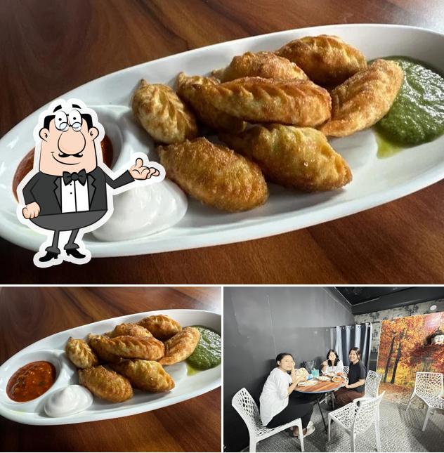 Among various things one can find interior and food at The destination of momos lover's Among various things one can find interior and food at The destination of momos lover's