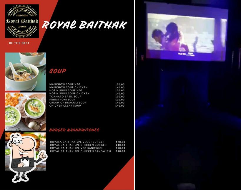Take a seat at one of the tables at Royal Baithak