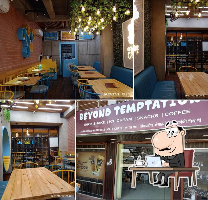 Take a seat at one of the tables at Beyond Temptation cafe