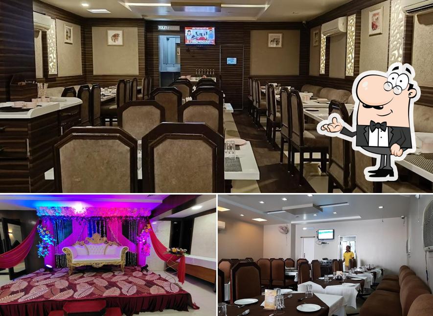 Take a seat at one of the tables at Amrapali Cafe