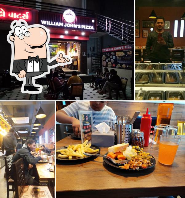 Take a seat at one of the tables at William John's Pizza