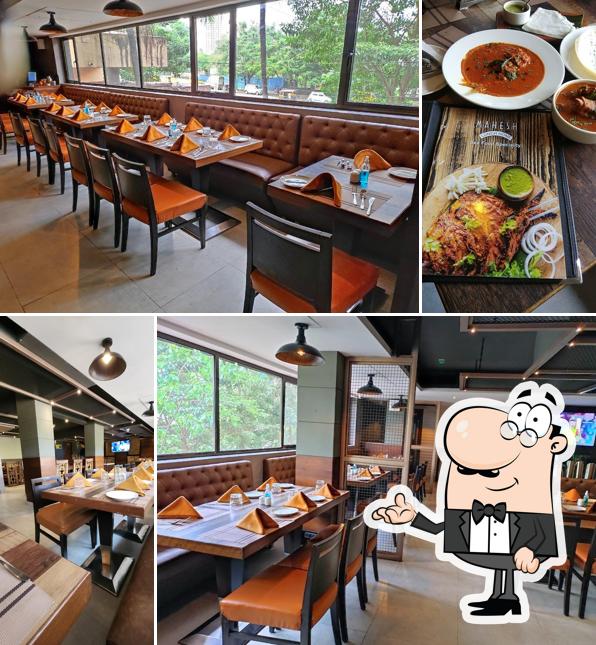 Take a seat at one of the tables at Mahesh Lunch Home Thane