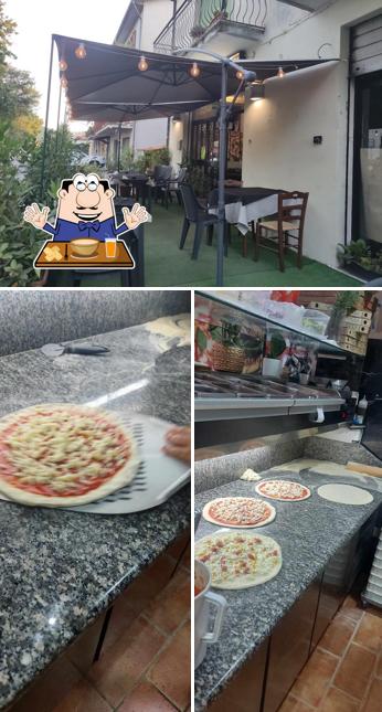 Guarda la immagine che mostra la cibo e interni di Pizzeria la quercia