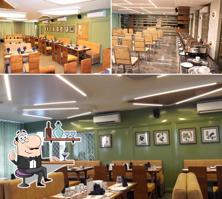 The interior of Status Fine Dine Restaurant & Banquet