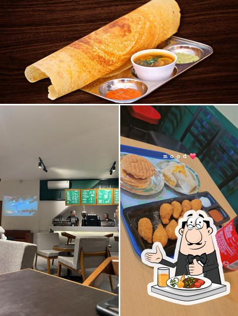 Among various things one can find food and interior at Roots Cafe- Best in Pizza,Momos,Burgers,wraps,shakes,Fries, South Indian Food, Best in Masala dosa, Idli, Vada