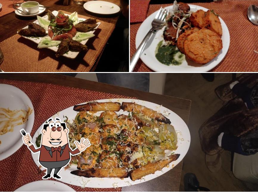 Among different things one can find food and dining table at Salt N Spice