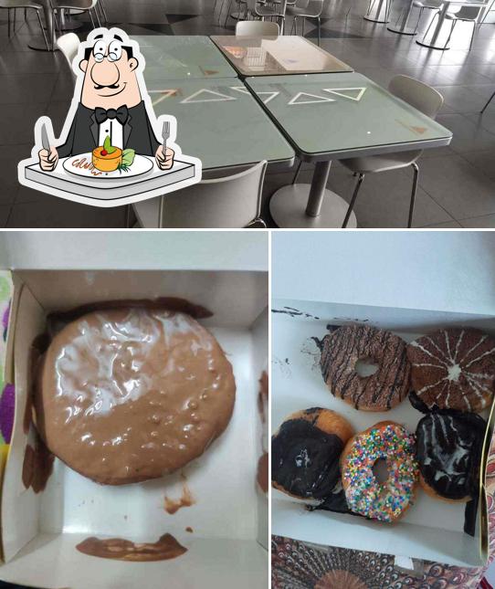 Check out the picture depicting food and interior at Donut House