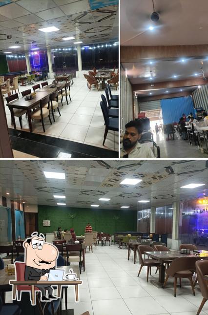 Take a seat at one of the tables at Master Dhaba