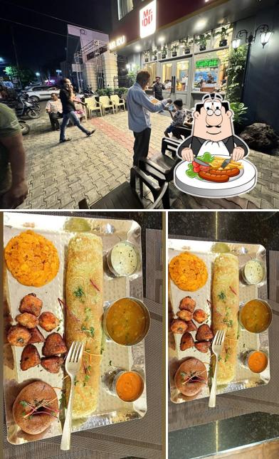 Take a look at the image depicting food and exterior at Mr. Idli