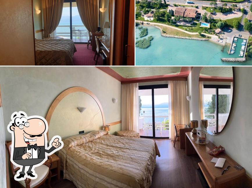 Tra le diverse cose da Aquila D'Oro Hotel & Lounge Bar si possono trovare la interni e esterno