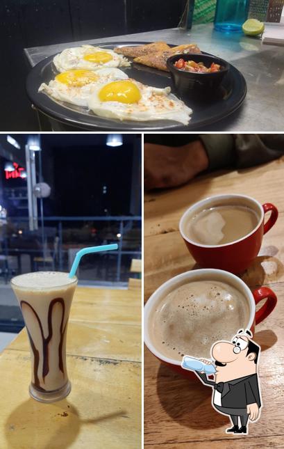 Check out the image showing drink and food at Cafe TidbiT