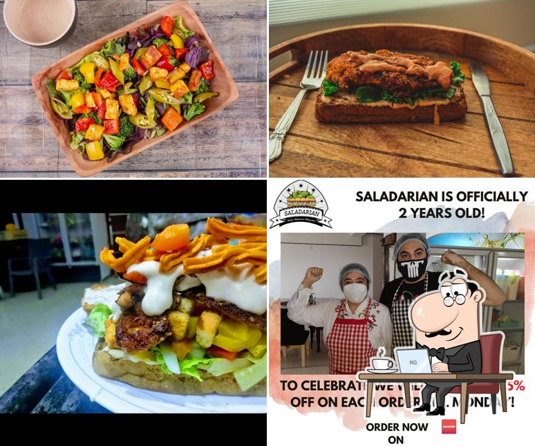 This is the image showing interior and food at Saladarian