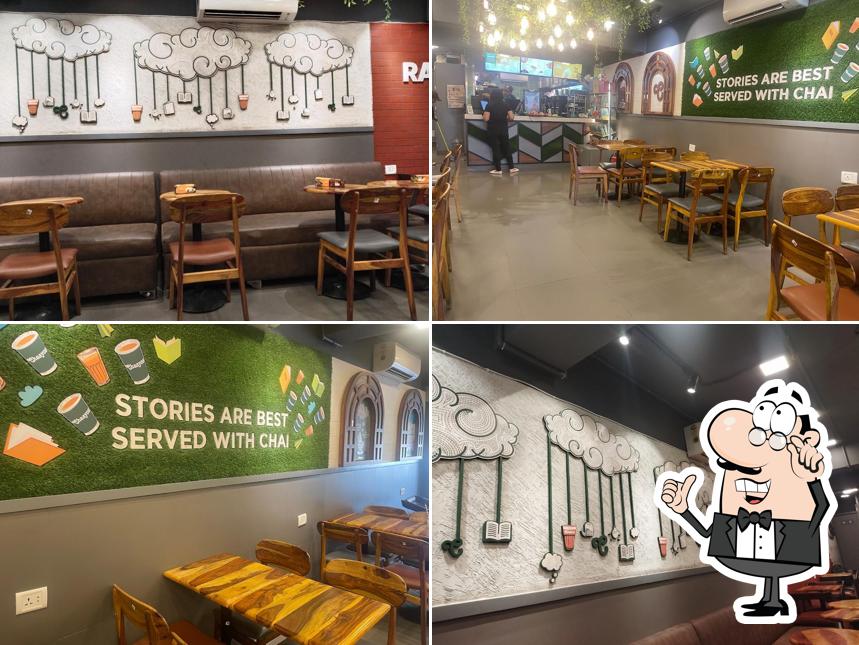Take a seat at one of the tables at Chaayos Cafe at Sector 15