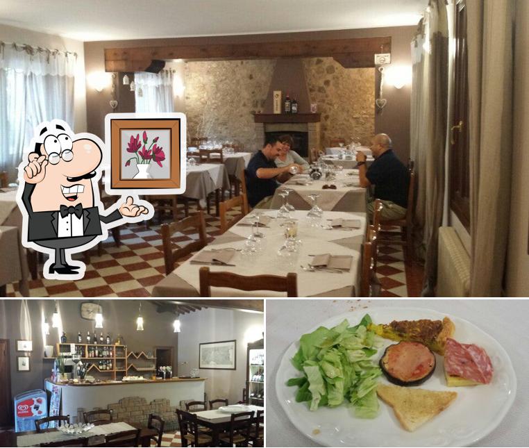 La foto della interni e cibo di Trattoria Tre Camini - ristorazione e servizio aperitivo con vista panoramica