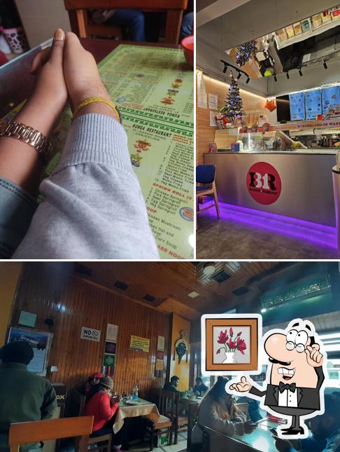 Take a seat at one of the tables at Kunga Restaurant