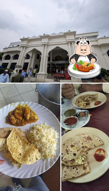 This is the picture showing food and exterior at Girhast Restaurant & Marriage Hall