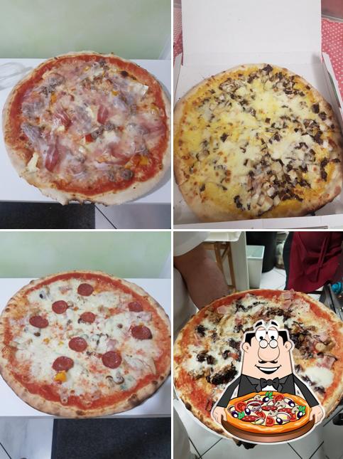 A Bar Pizzeria Fermati Qui, puoi ordinare una bella pizza