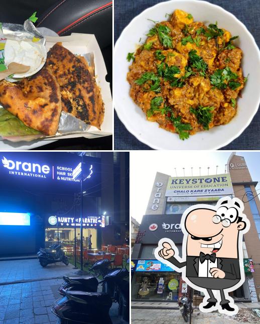 Among different things one can find exterior and food at Aunty de parathe,Vastrapur