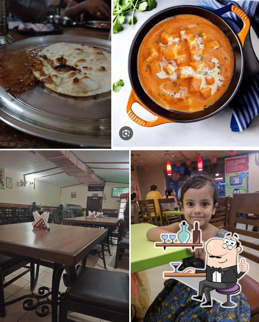 Check out the picture displaying interior and food at Tandoori Bites