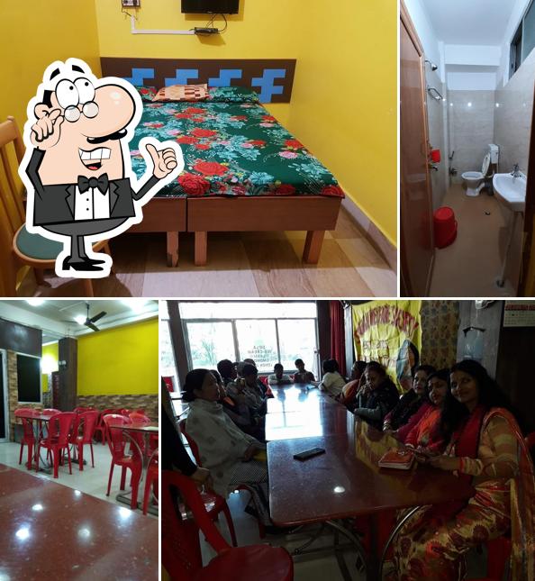 Take a seat at one of the tables at Hotel Rosy