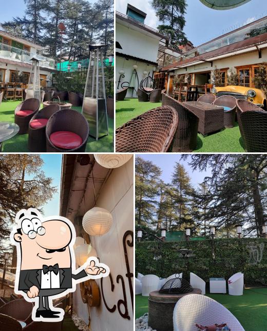 Take a seat at one of the tables at The Que Cafe